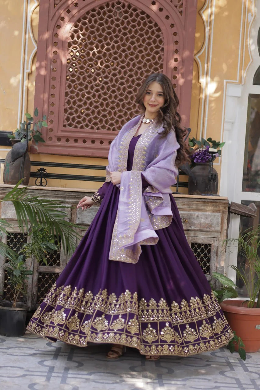 purple gown with dupatta twirl with gold zari hem