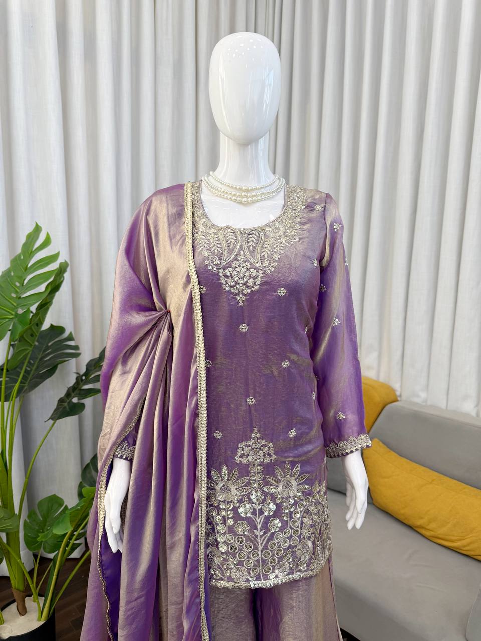 Purple kurta neckline embroidery with intricate threadwork for festive ethnic wear