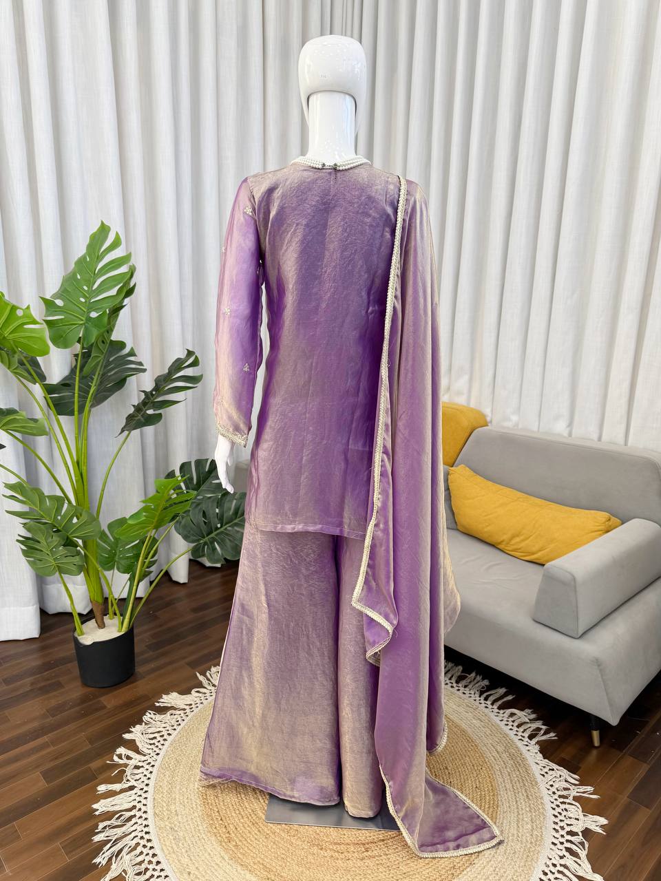 Back view of lavender kurta palazzo set with dupatta for traditional occasions