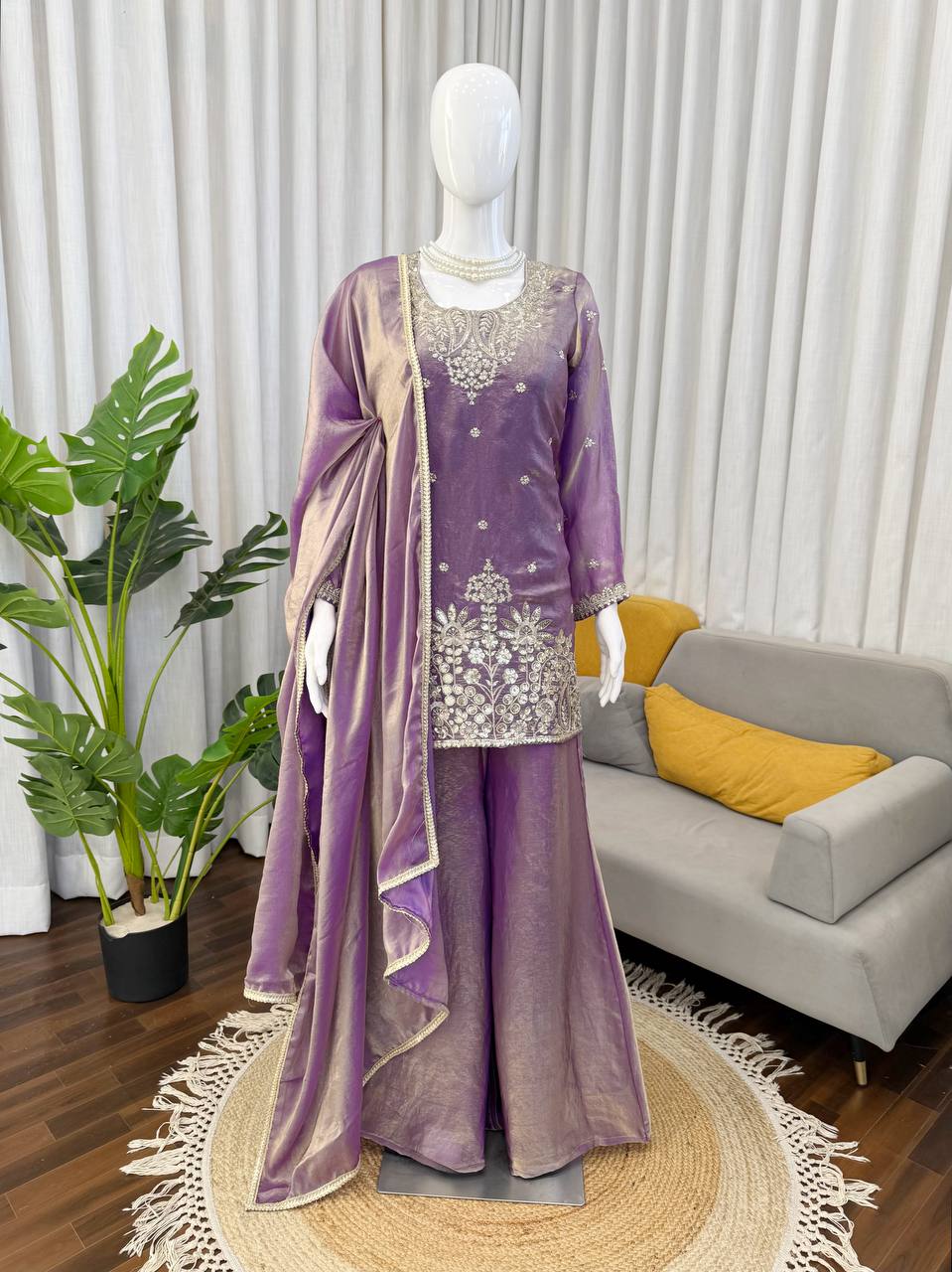 Lavender purple kurta palazzo set on mannequin with dupatta and embroidery details