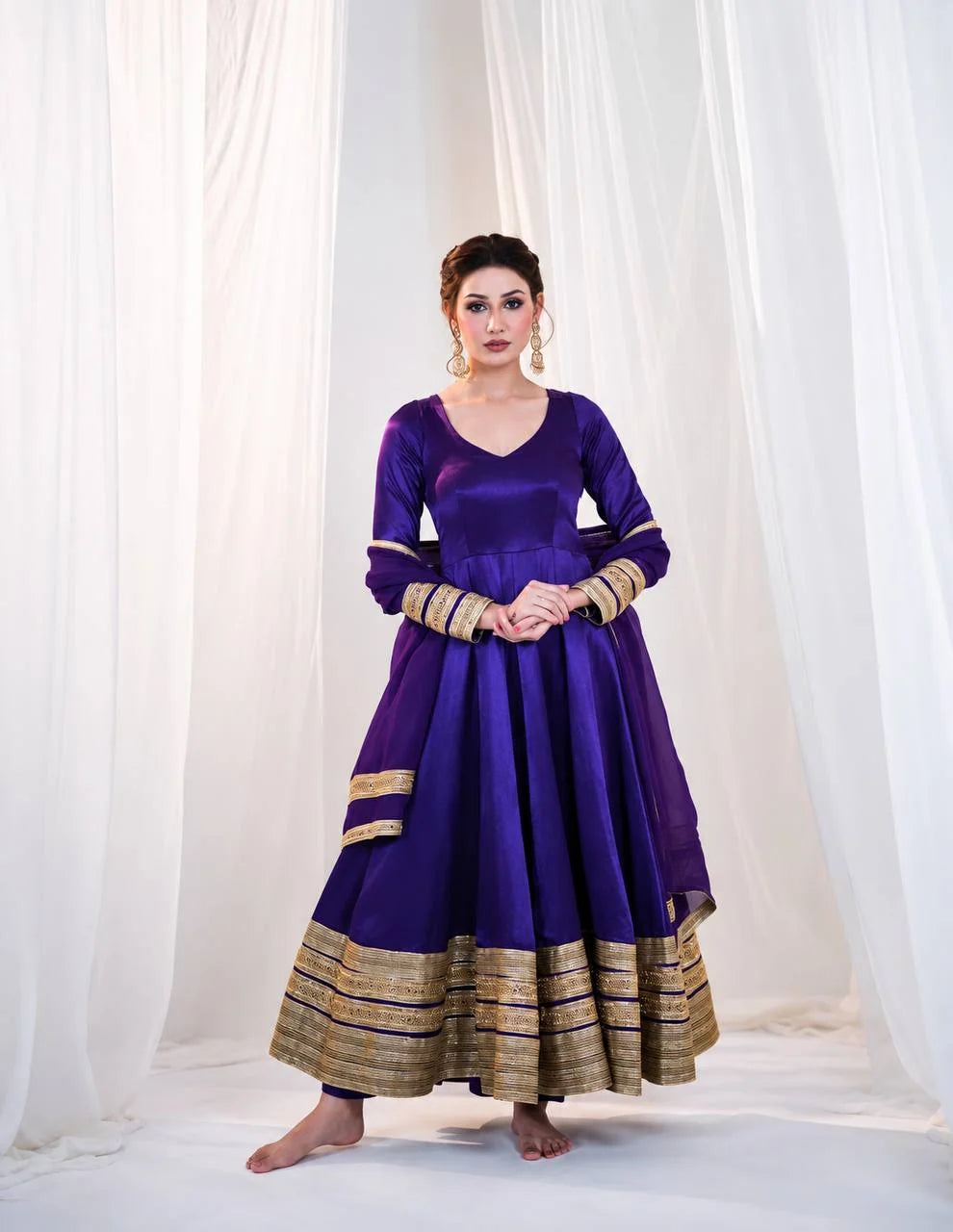 Full length purple silk anarkali gown with gold sequin border and micro pant