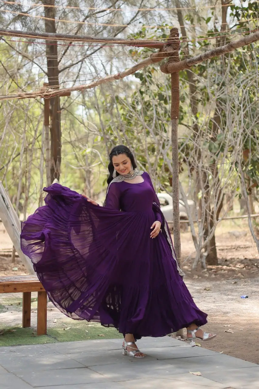 Purple tiered frill anarkali gown spinning with full flare – smiling model outdoor pose