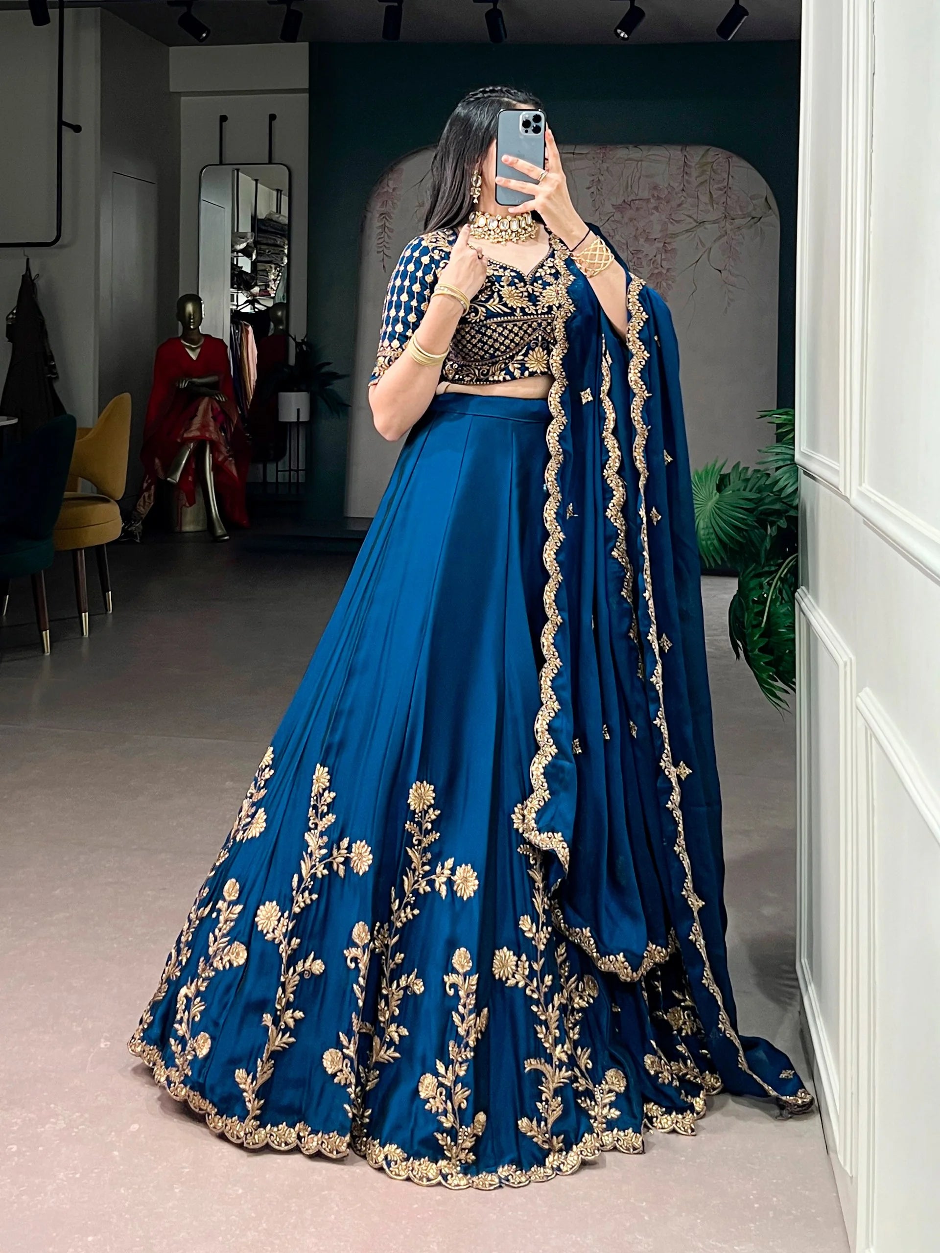 teal blue rangoli silk lehenga choli dupatta draped