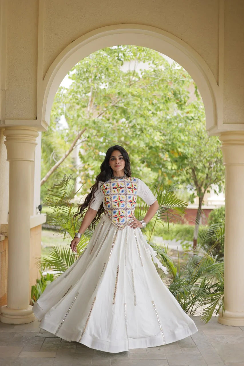 Rayon chaniya choli in white with Kutchi mirror crop blouse and mirror-lace flared skirt, front view