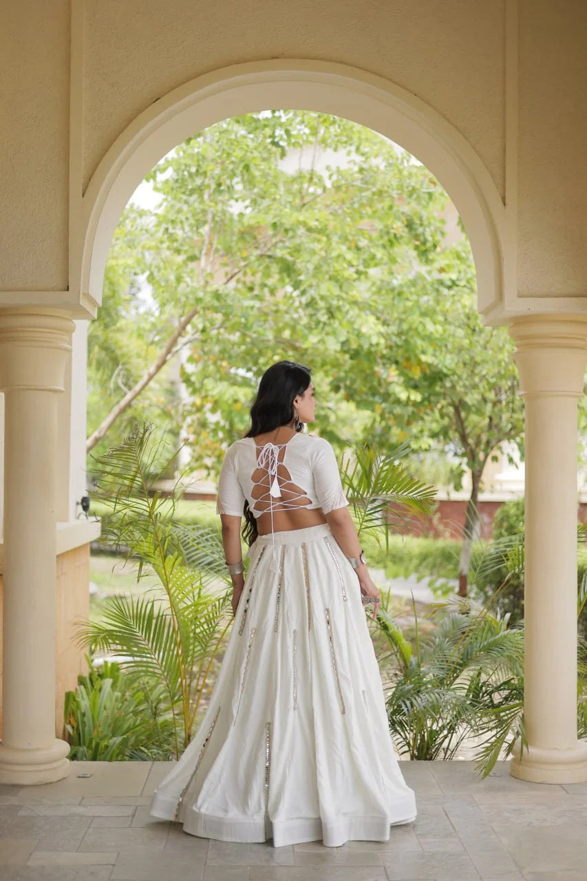 White chaniya choli blouse back with lace-up dori and half sleeves, view