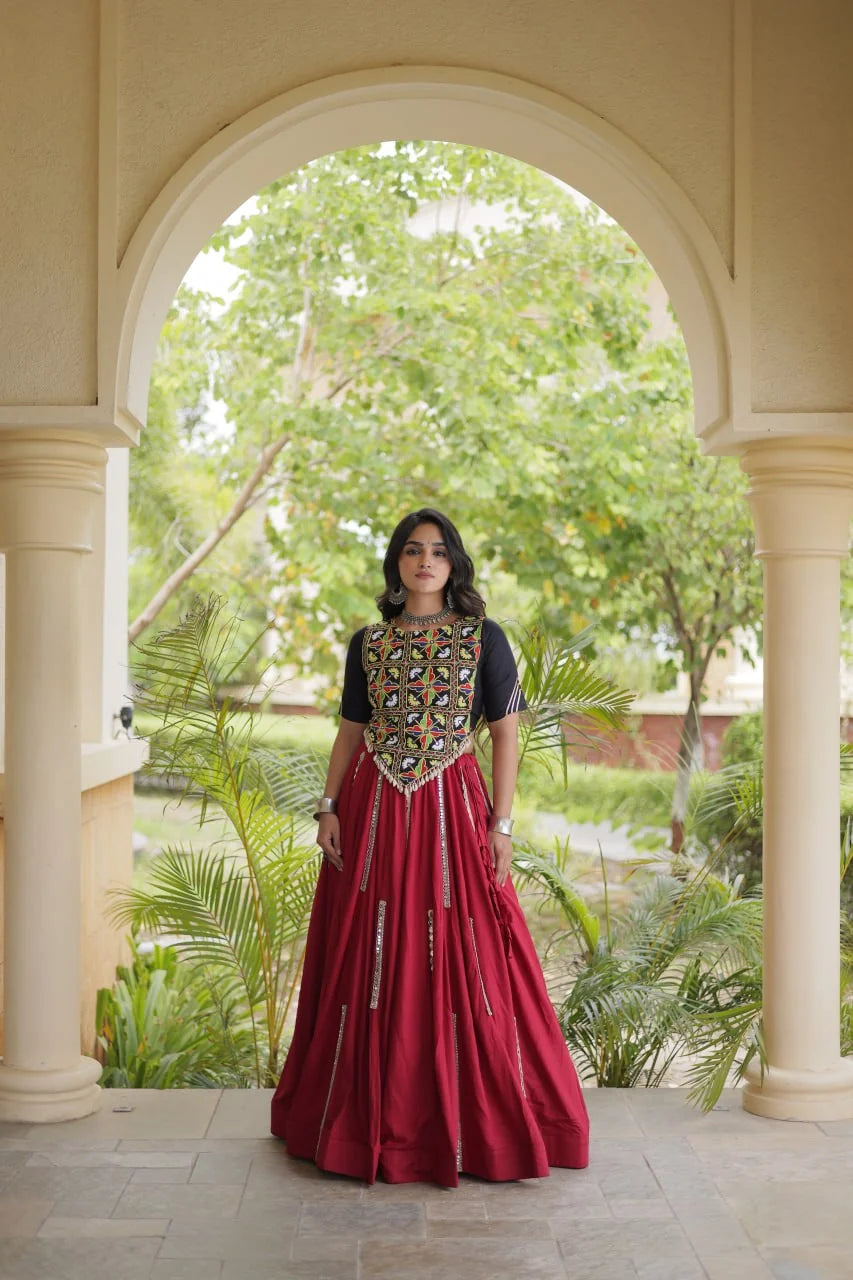 Rayon chaniya choli in maroon with black Kutchi mirror crop blouse and flared skirt, front view