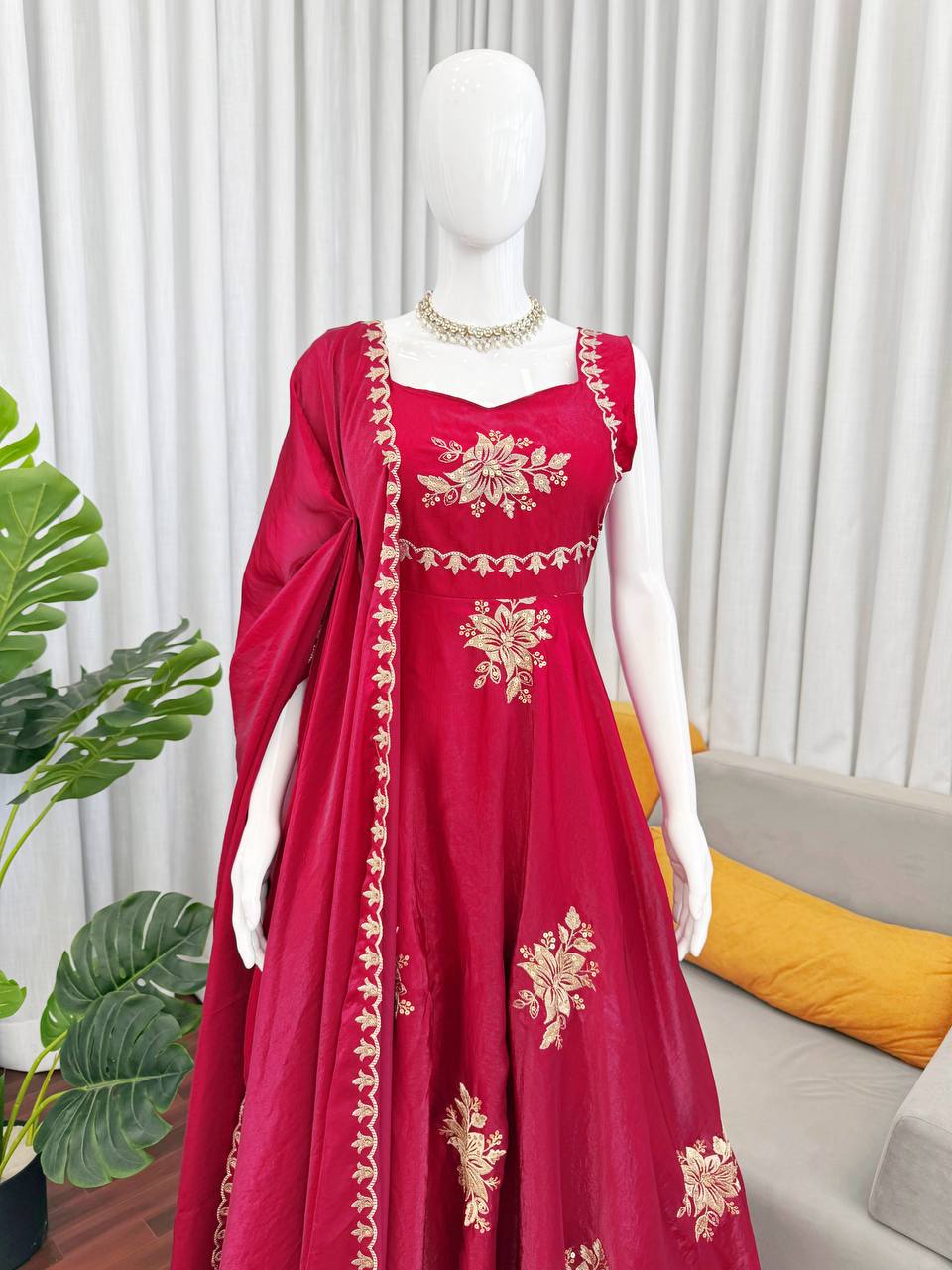 Red embroidered Fendy silk Anarkali palazzo set with dupatta displayed on mannequin indoor