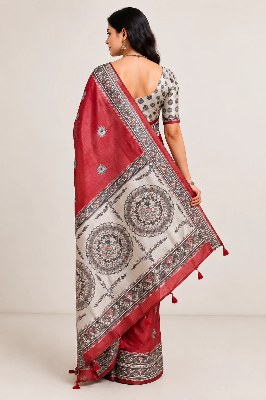 Red chaapa silk saree with Madhubani print pallu and white mandala motifs – back view