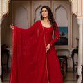 Full-length red georgette anarkali suit set with dupatta and gold gota border – flare view