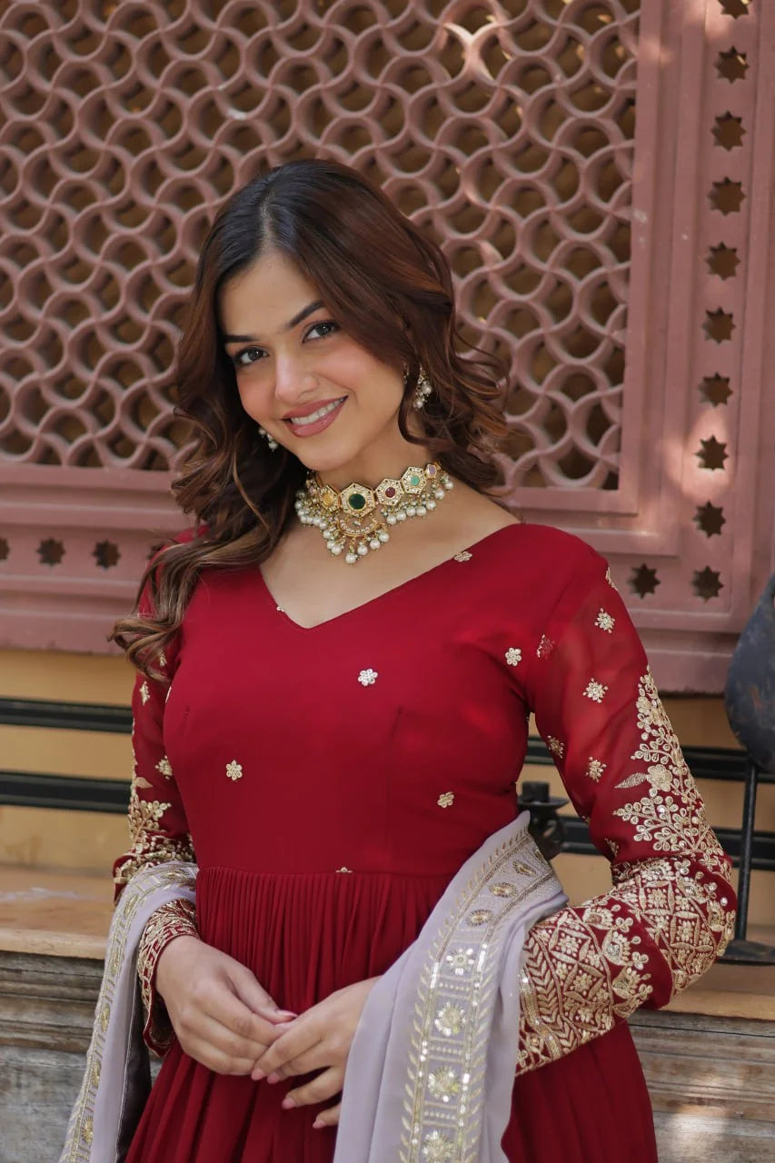red gown zari embroidered sleeves closeup with grey dupatta
