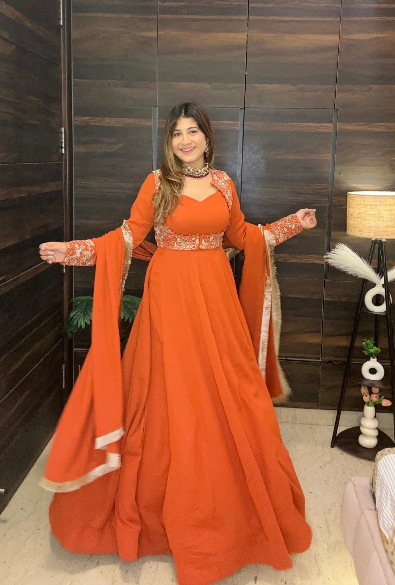 Rust flared anarkali with wide bell sleeves and embroidered yoke – full flare view