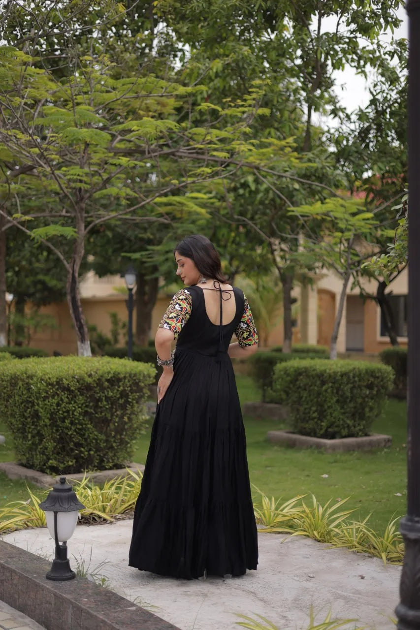 Black navratri gown with open back dori and tiered rayon flair, back view