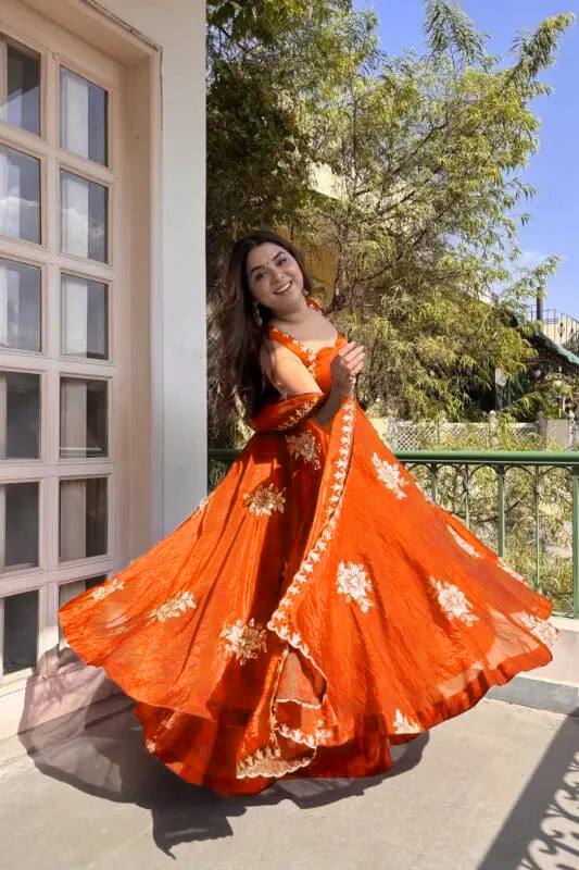 Rust orange silk embroidered Anarkali palazzo set with dupatta front pose traditional Indian outfit