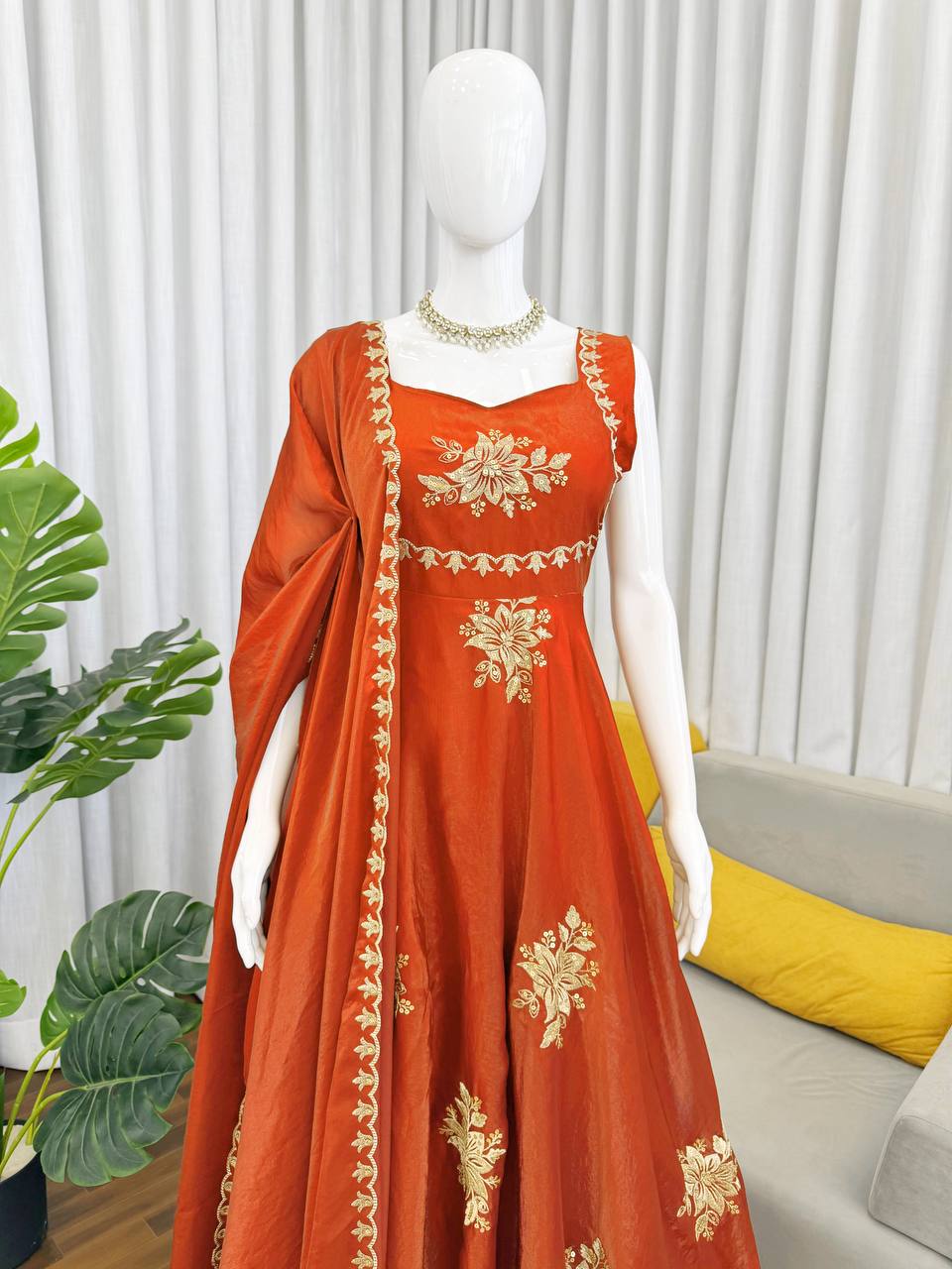 Rust orange Fendy silk embroidered Anarkali palazzo set with dupatta displayed on mannequin