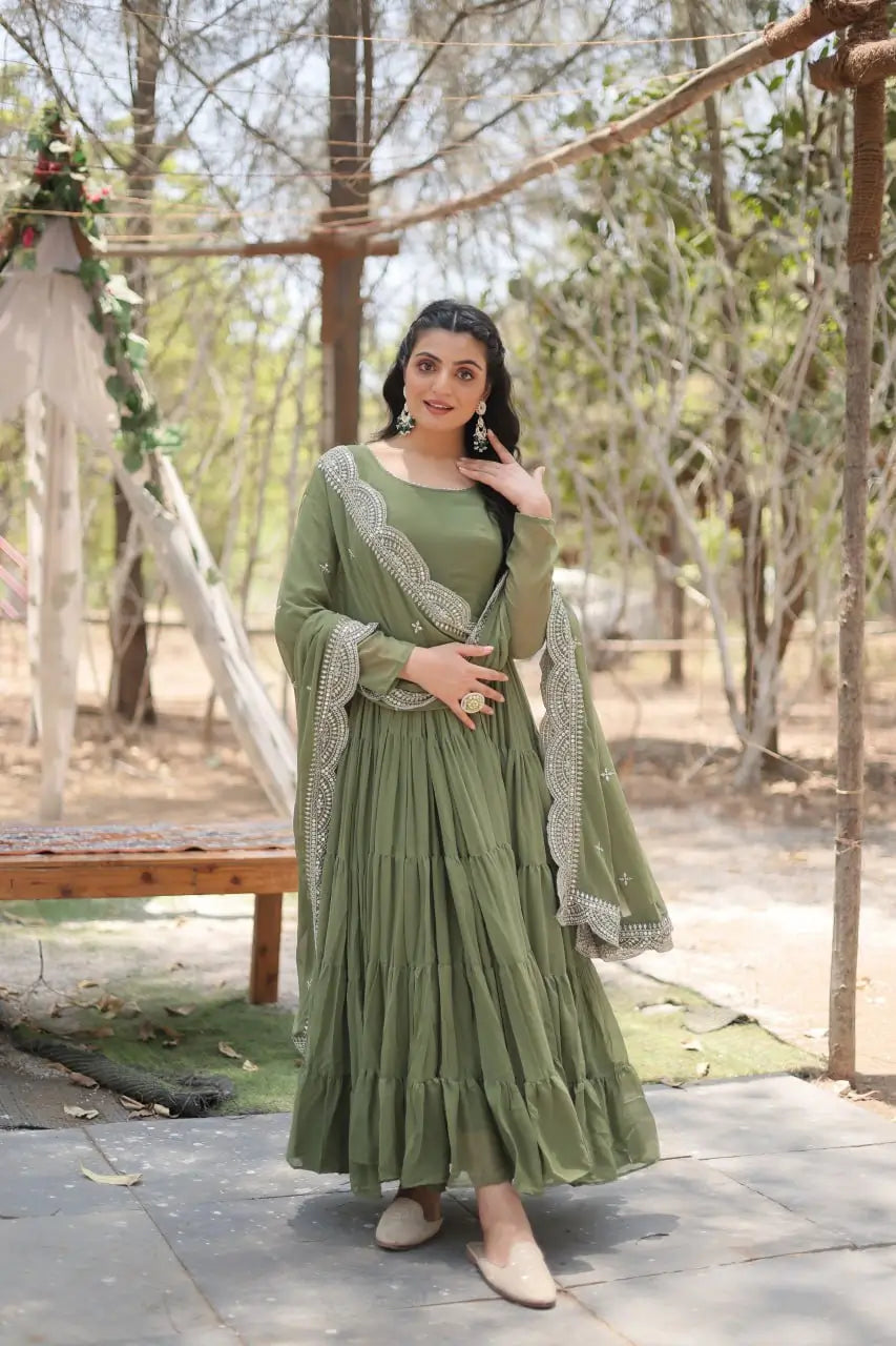 Sage green flared anarkali gown with silver sequin embroidered dupatta – model pose
