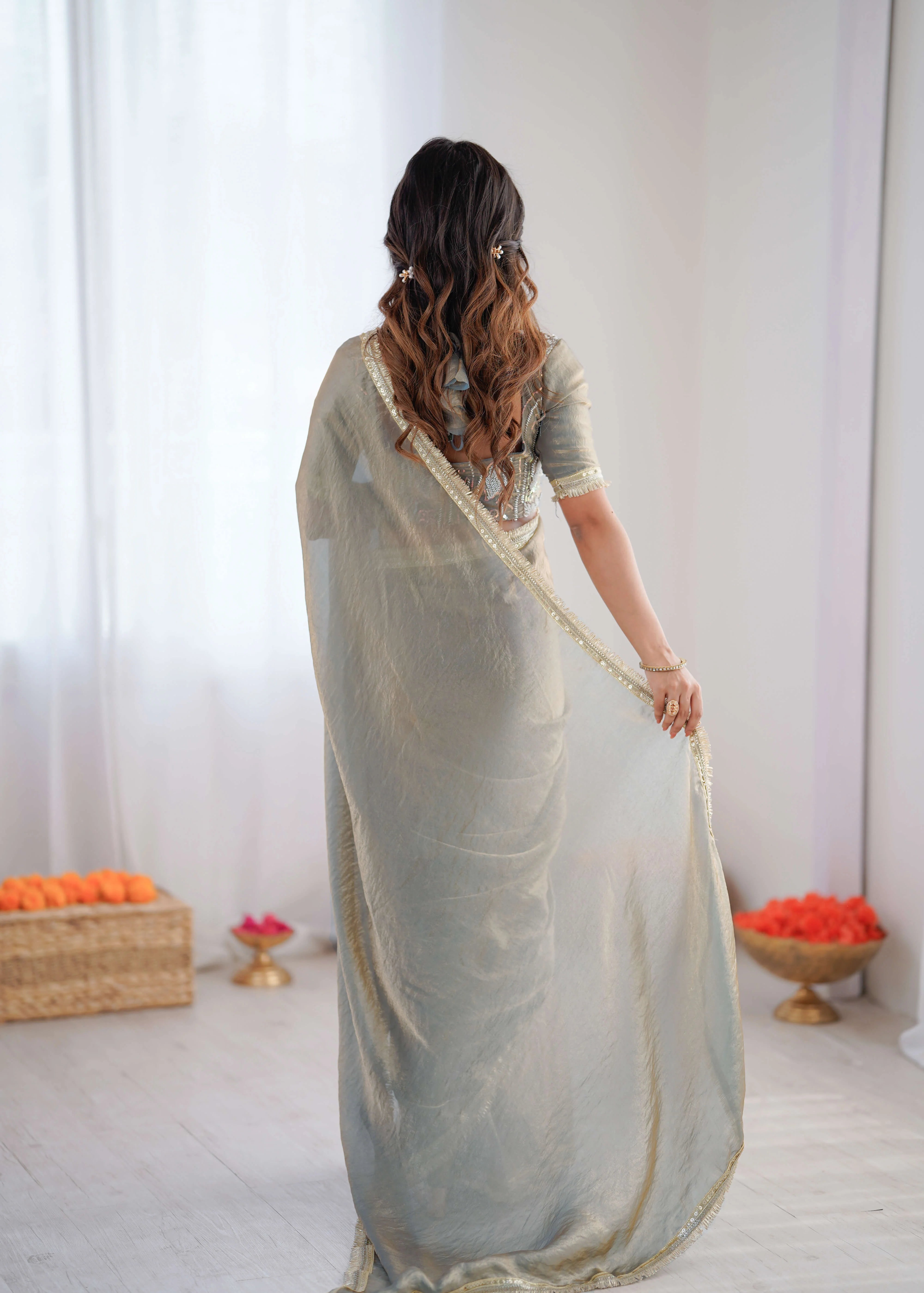 sage grey georgette designer saree back view gold fringe border