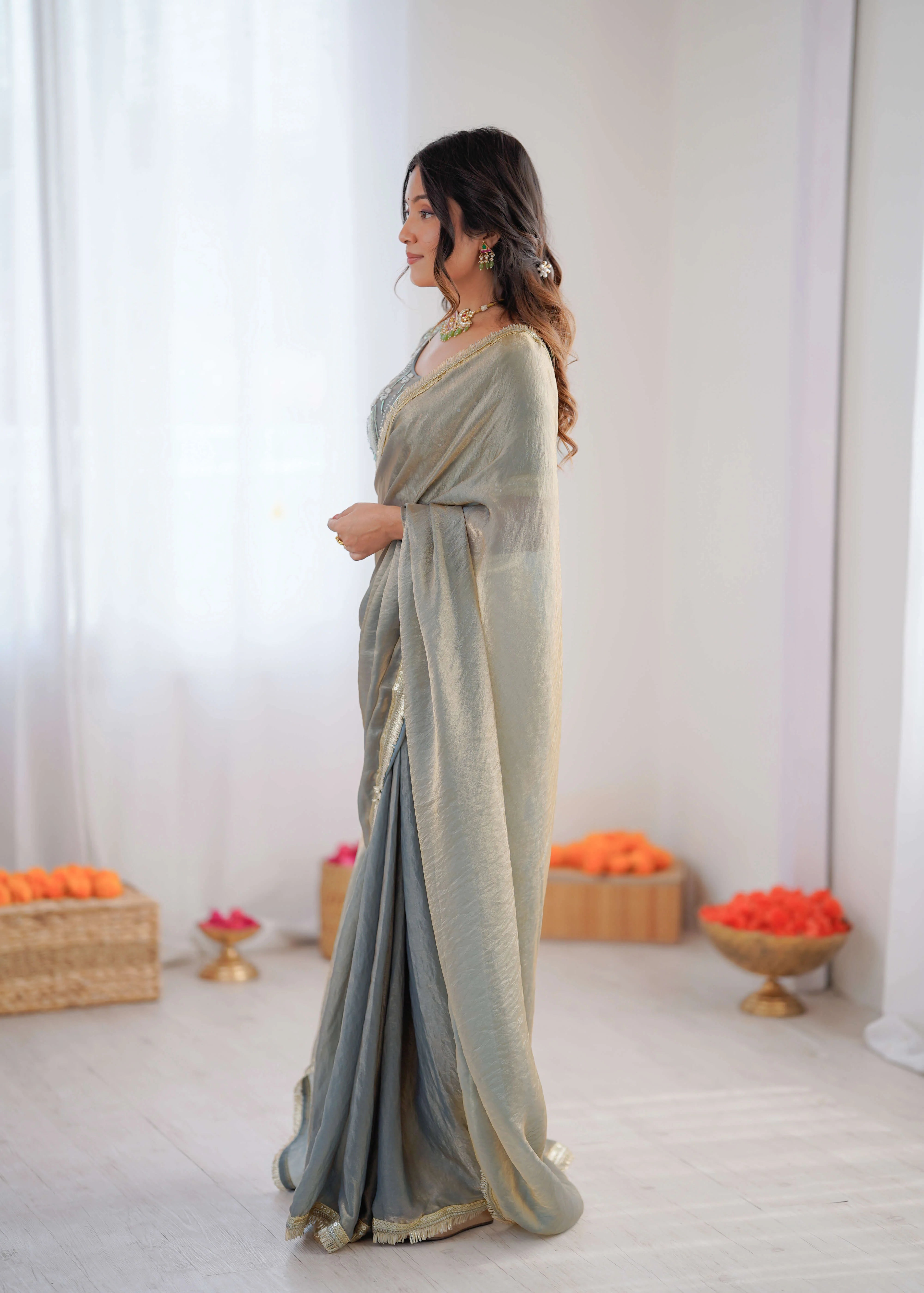 sage grey georgette saree gold fringe border side profile view