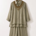 Salsa tissue coord set in sage green with bead embellished neckline – flat lay