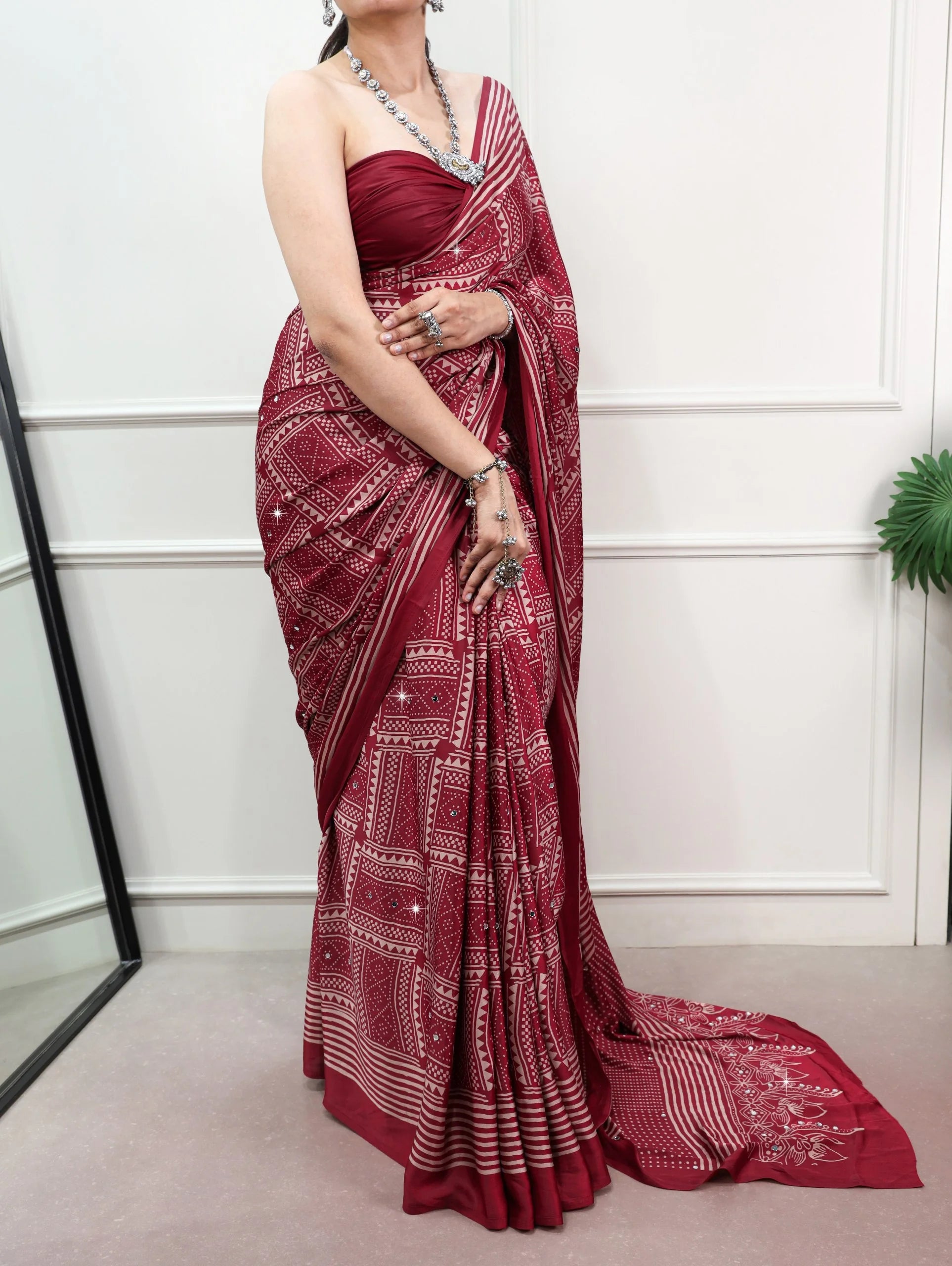 Maroon satin silk saree with mirror work geometric print full model front view