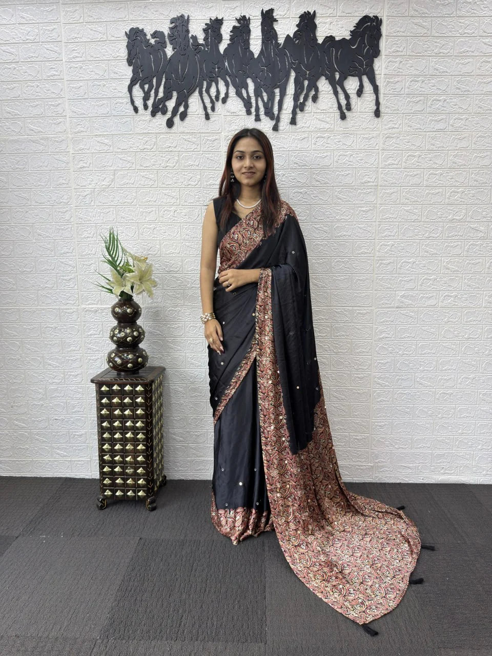 black semi gajji silk saree with mirror work and printed border pallu