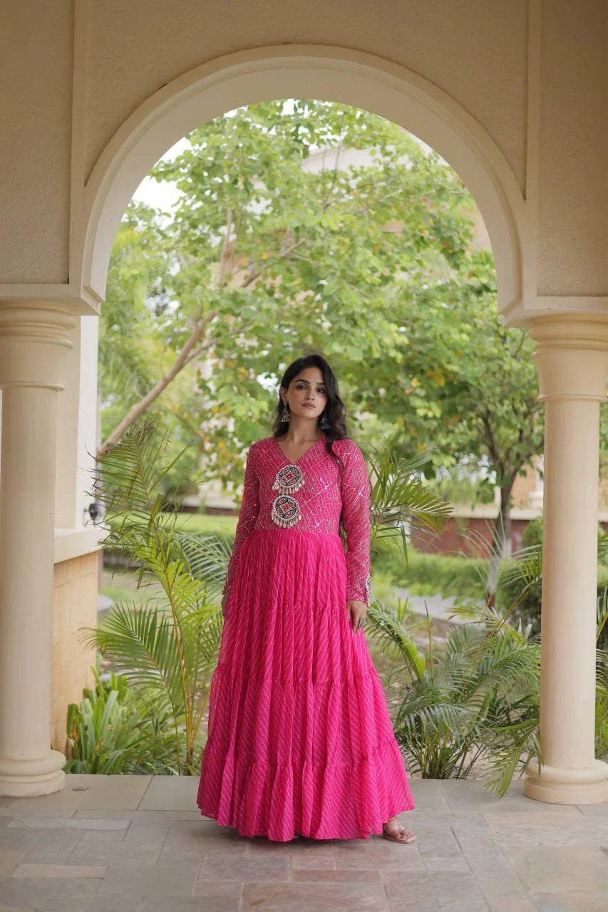 rani pink sequin leheriya gown front with dual cowrie medallions
