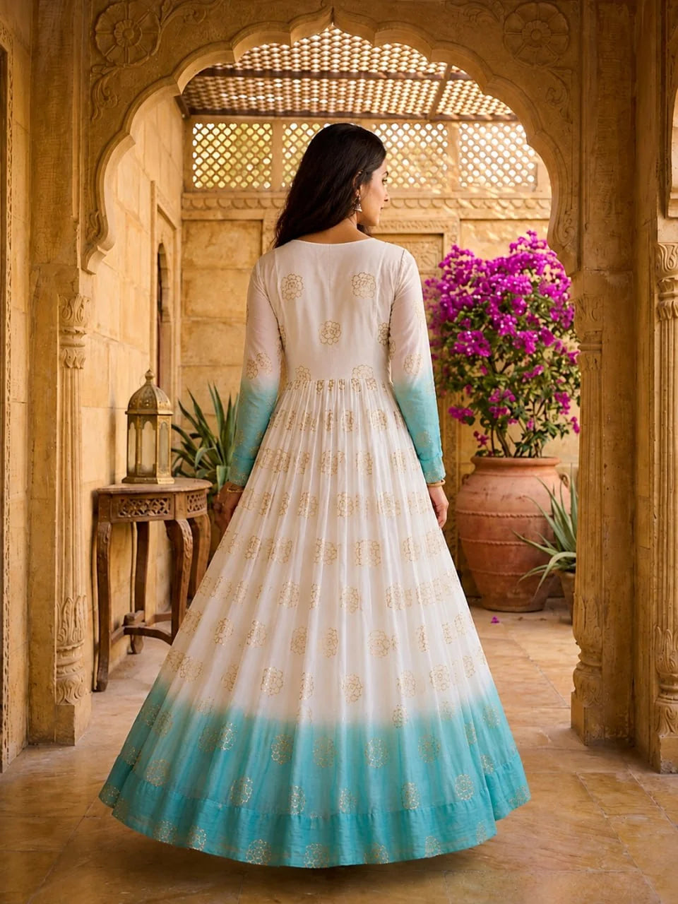 Sky blue shaded anarkali gown – back view with ombre hem and golden sequin embroidery