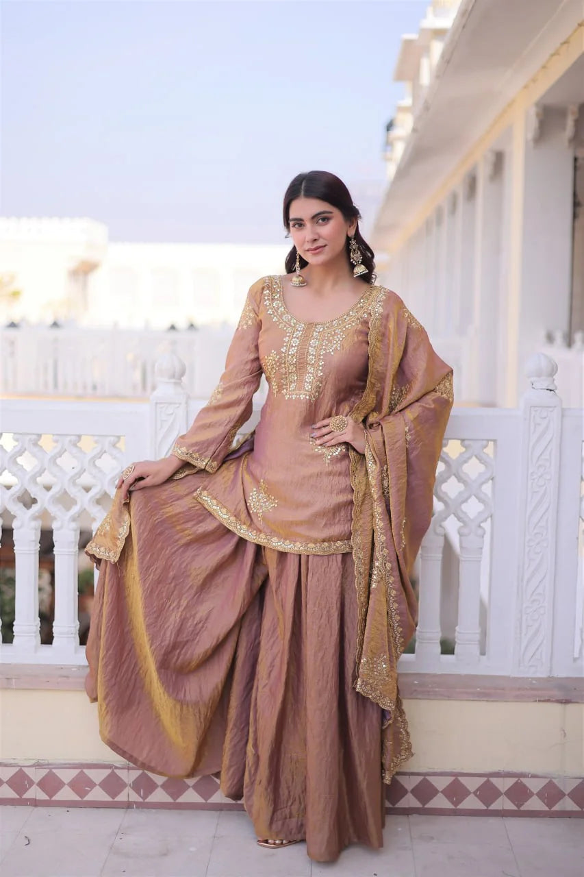 copper sharara set leaning with embroidered dupatta