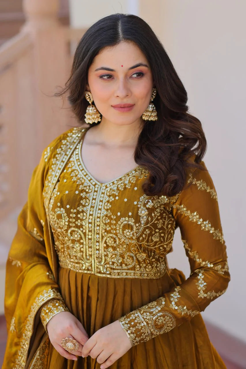 mehendi gold silk gown portrait with jhumka styling