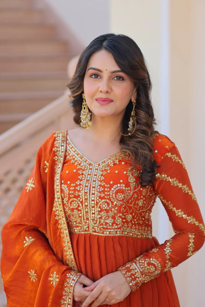 rust orange silk gown zari embroidered bodice portrait