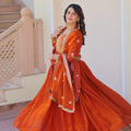 rust orange silk gown with dupatta twirl side view