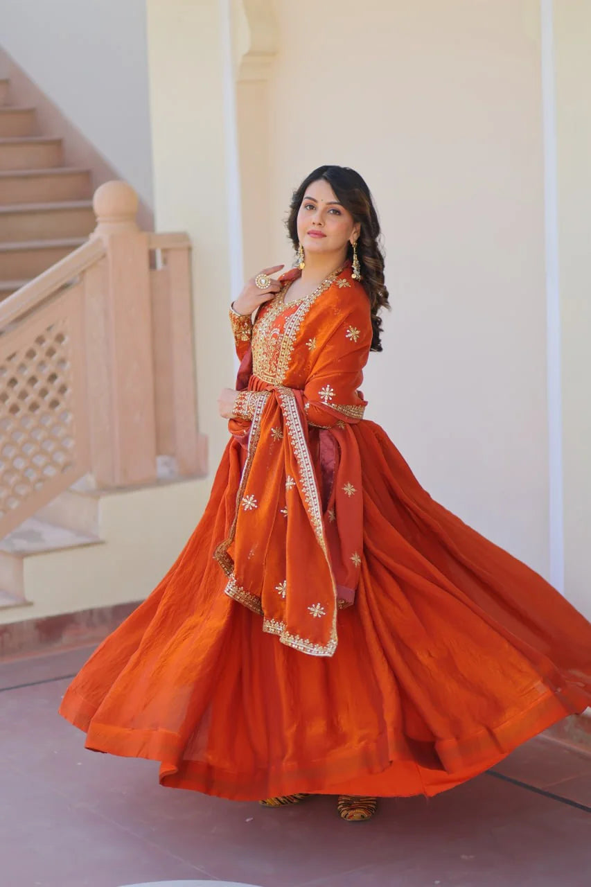 rust orange silk gown with dupatta twirl side view