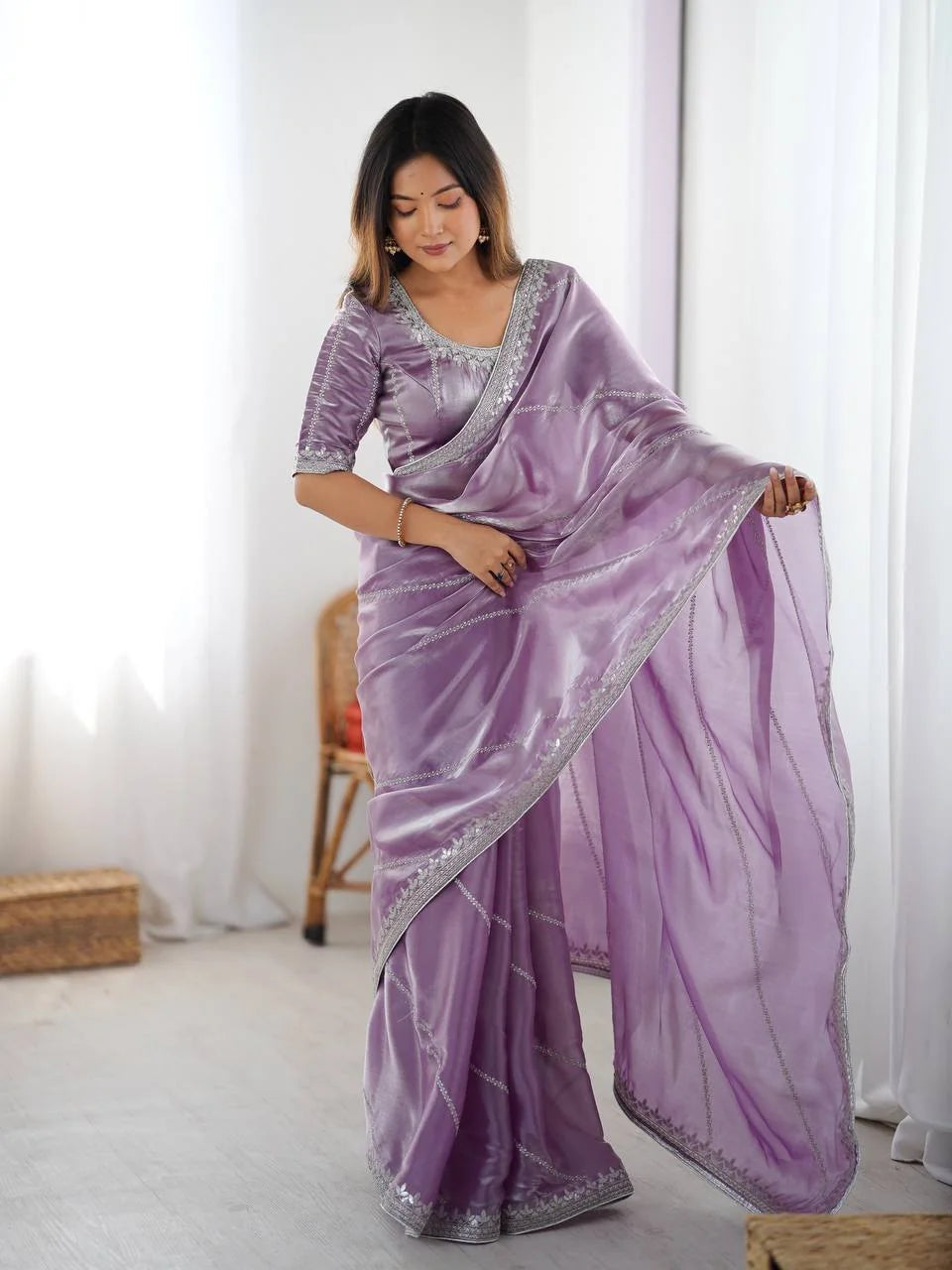 Lavender JMC silk saree with silver border embroidery — back view showing full drape