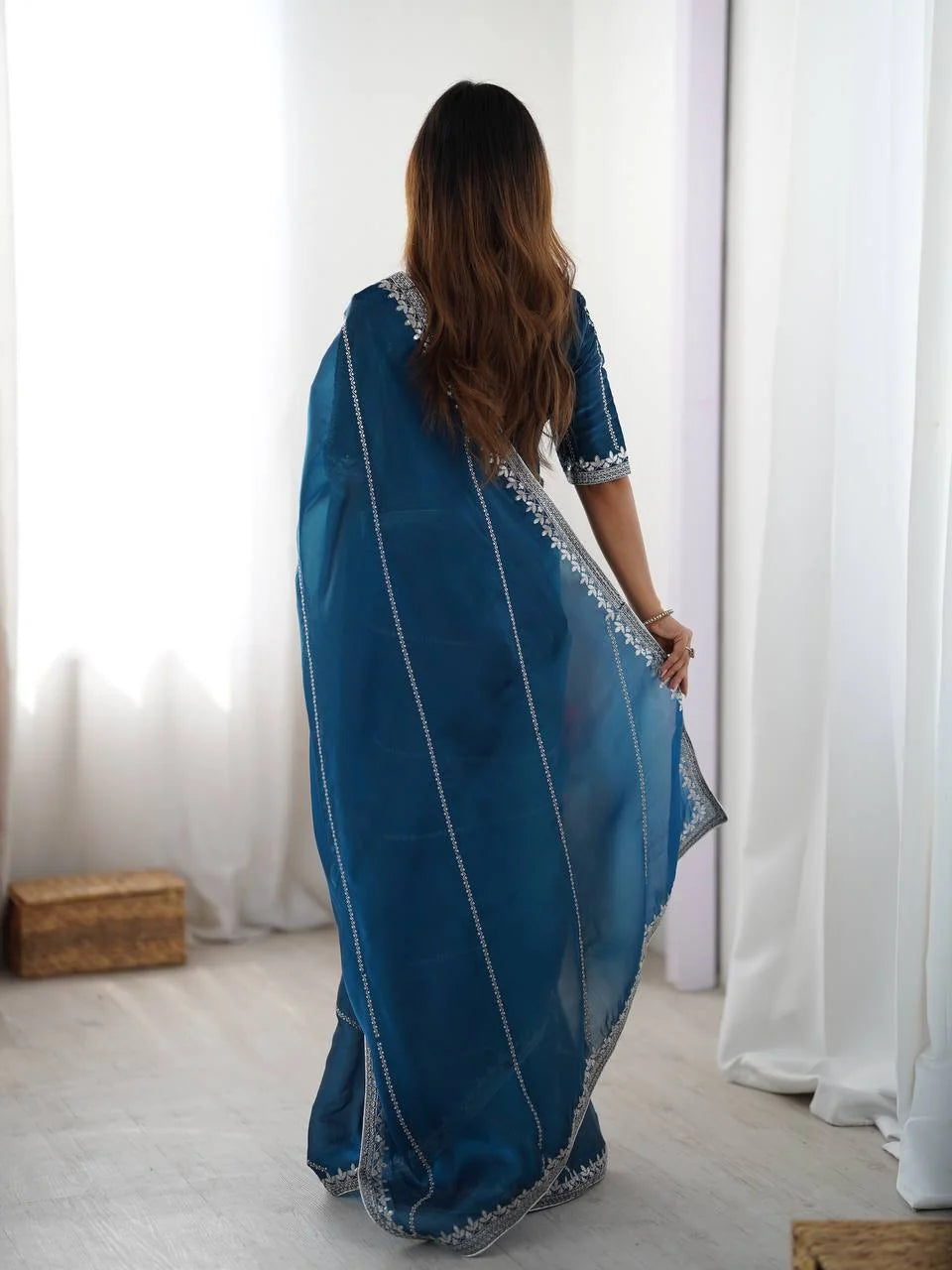Maroon silk saree with silver thread and sequin work — front view border detail