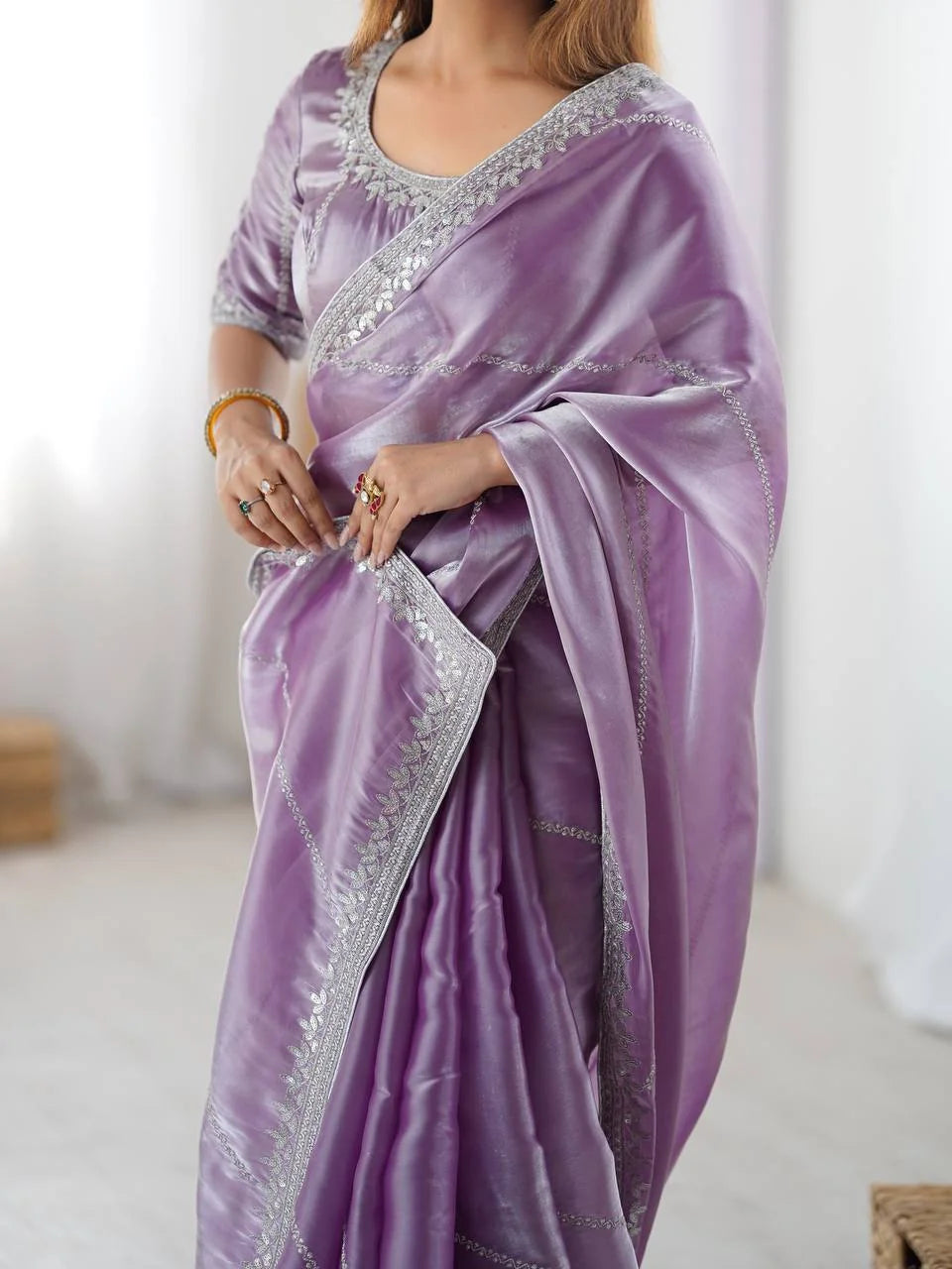 Purple silk saree blouse with silver thread and sequin embroidery — round neckline