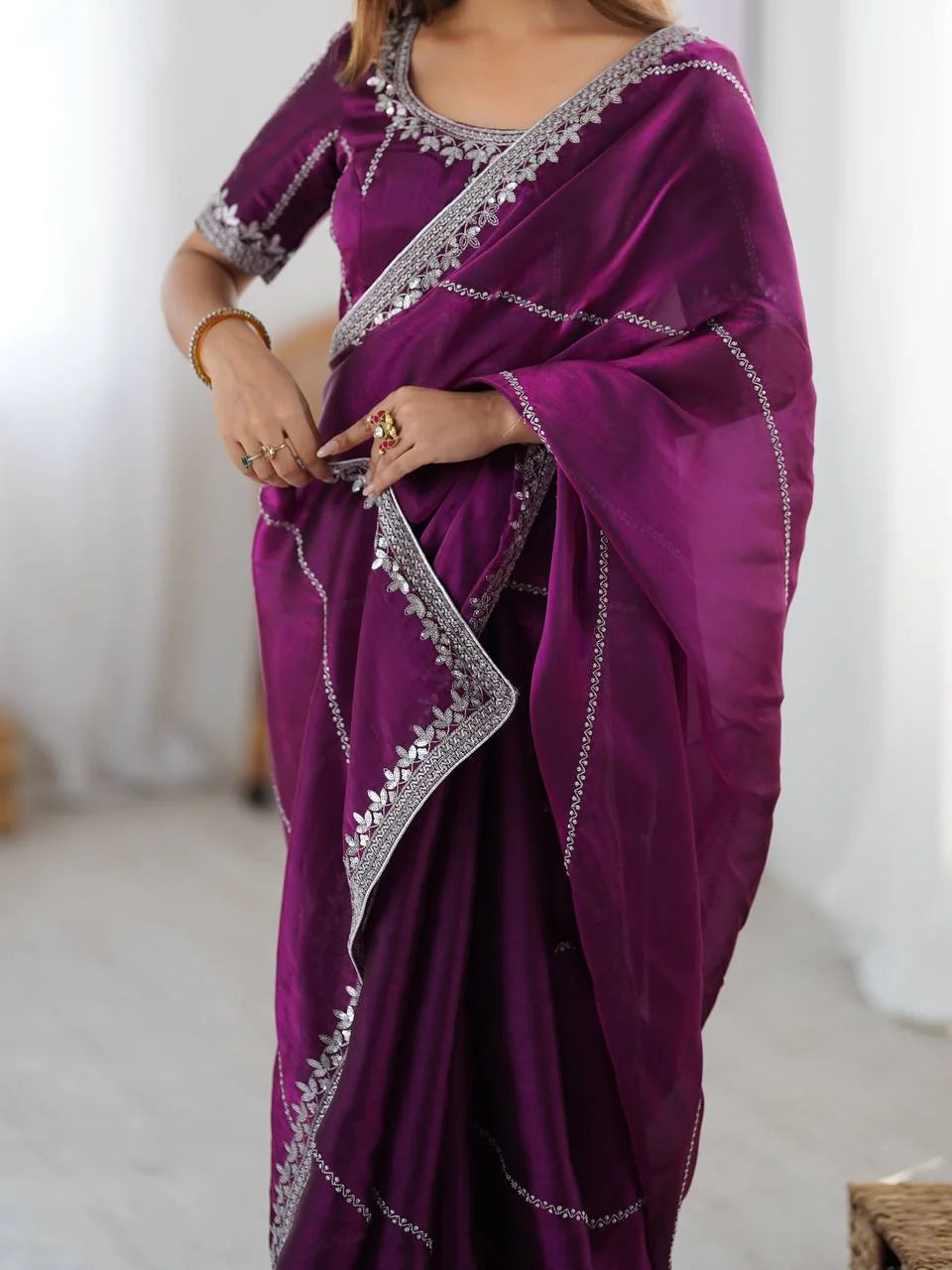 Heavy JMC silk saree purple — close-up of silver thread leaf embroidery on border