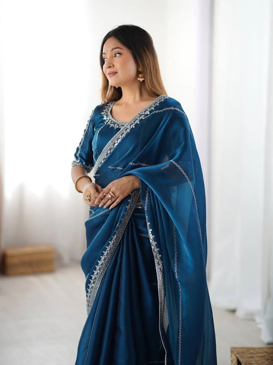 Chicora Wear teal silk saree with thread and sequin work — 3/4 view with matching blouse