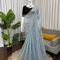 Sky blue Fendy silk embroidered saree with sequence and beads work and velvet blouse full view