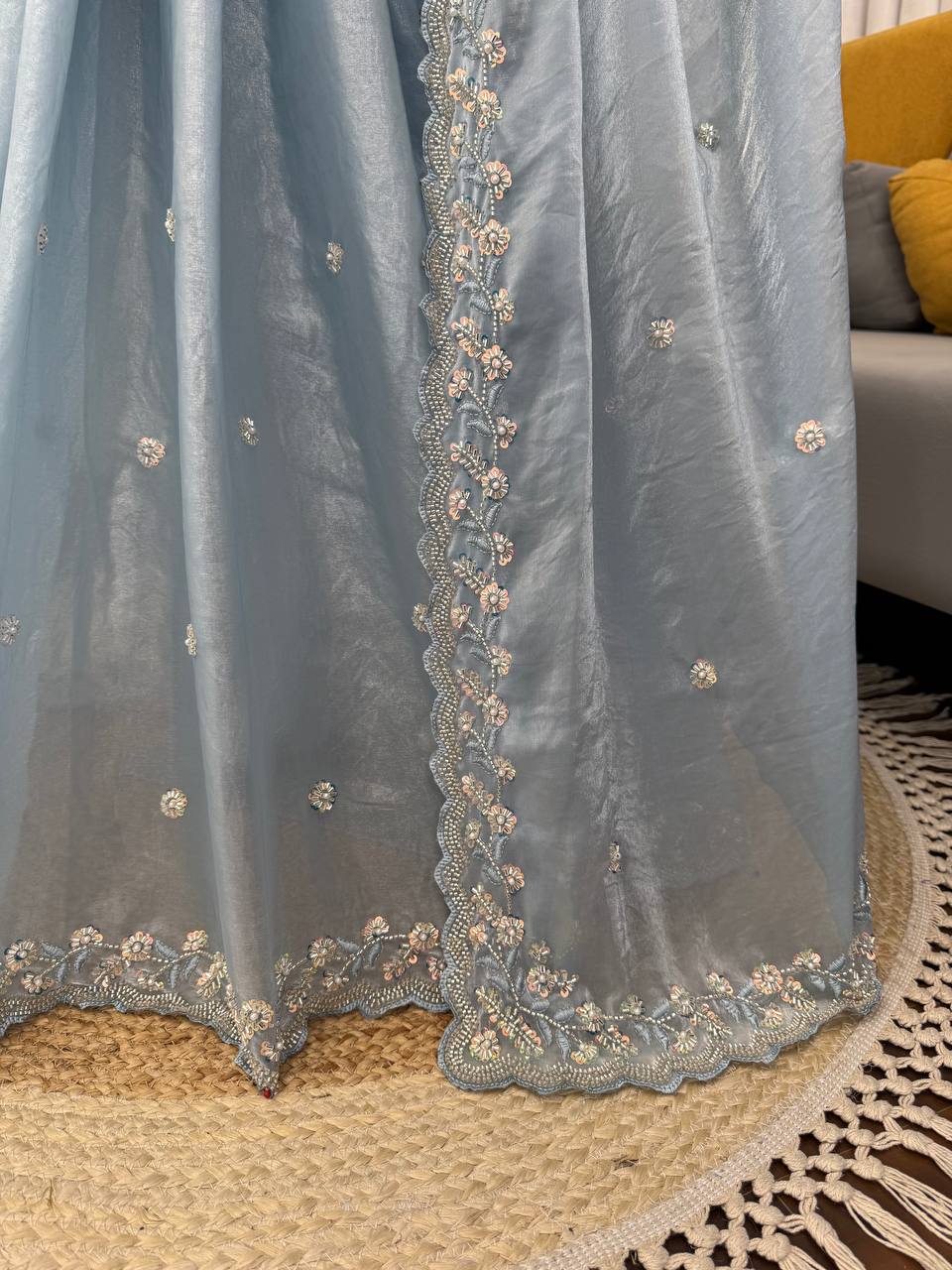 Mannequin display of sky blue embroidered saree with velvet blouse