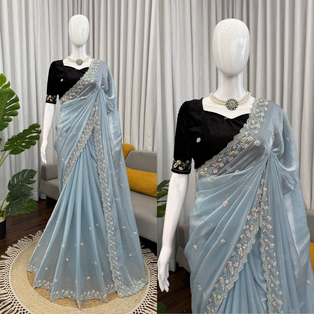 Mannequin display of sky blue embroidered saree with velvet blouse