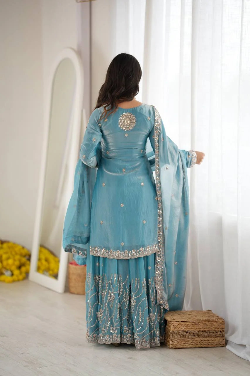 Teal blue fendy silk sharara set back view with bead work kurti and dupatta
