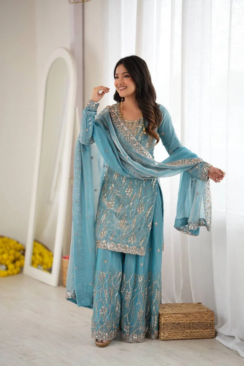 Teal blue fendy silk sharara set front view with silver sequin embroidery and dupatta