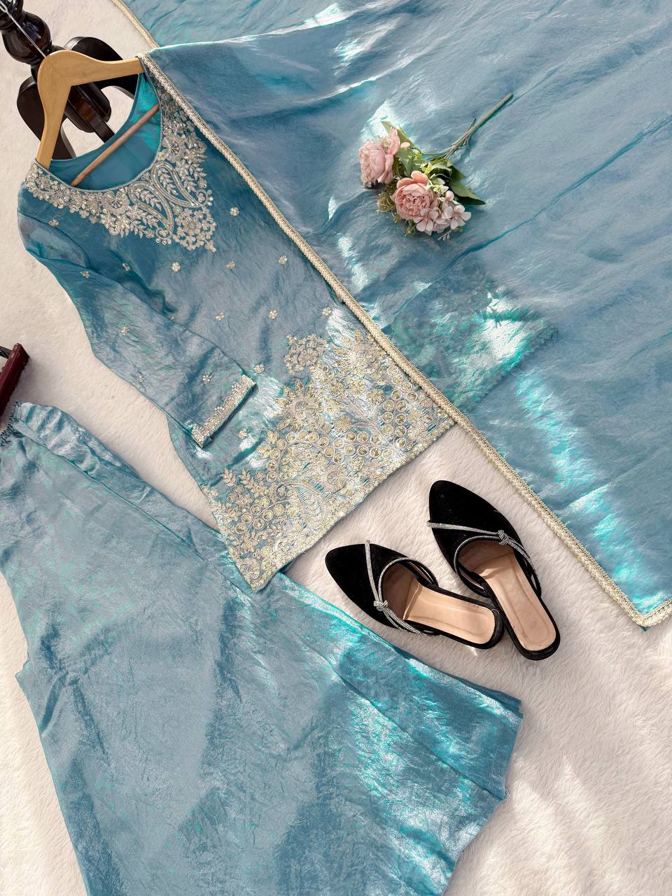Teal kurta palazzo set flat lay with dupatta and accessories for festive styling