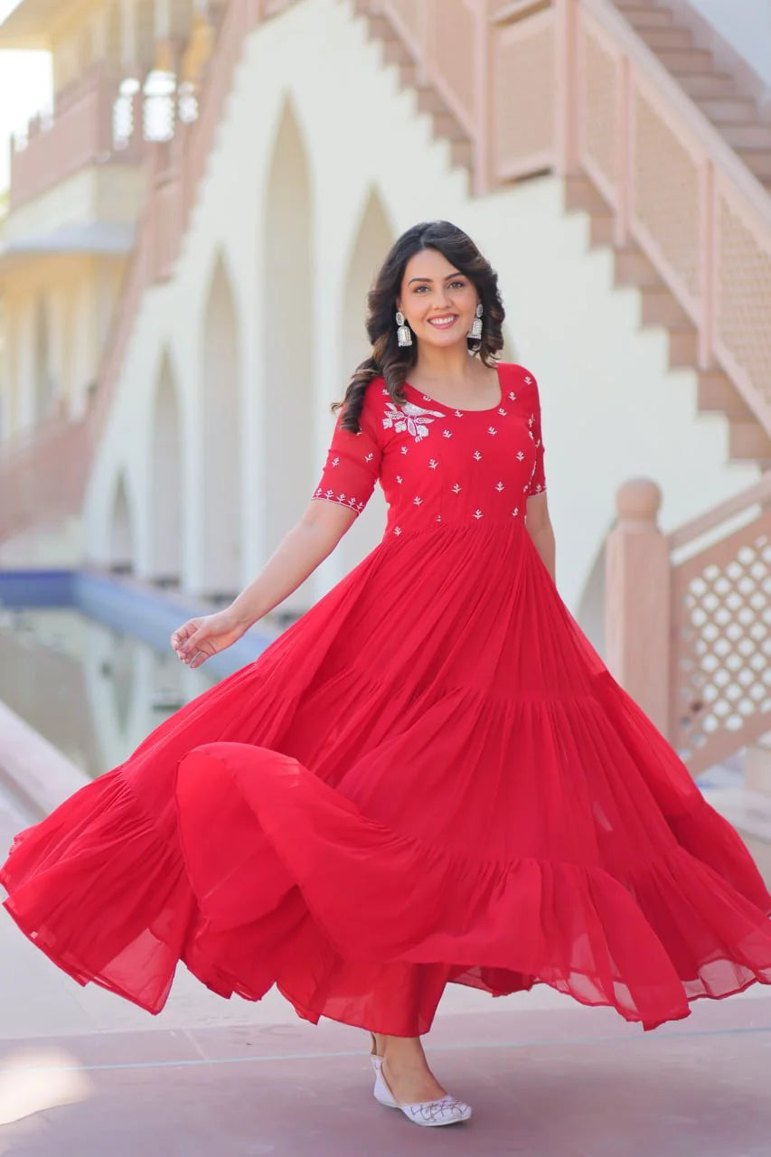 red tiered gown twirl with ruffle flare