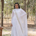White faux georgette tiered frill anarkali gown with sequin embroidered dupatta – front view