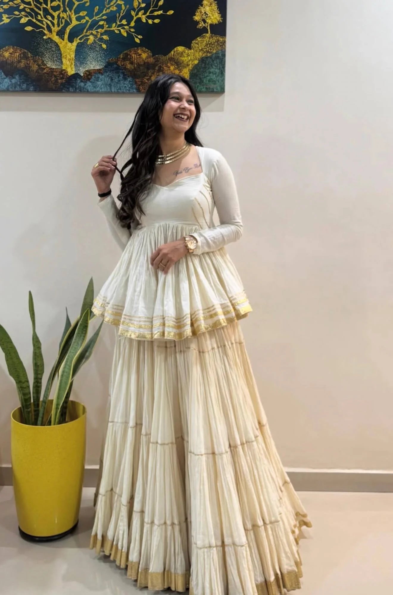 White cotton kediyu lehenga set front view gold gotta patti border Navratri Chicorawear