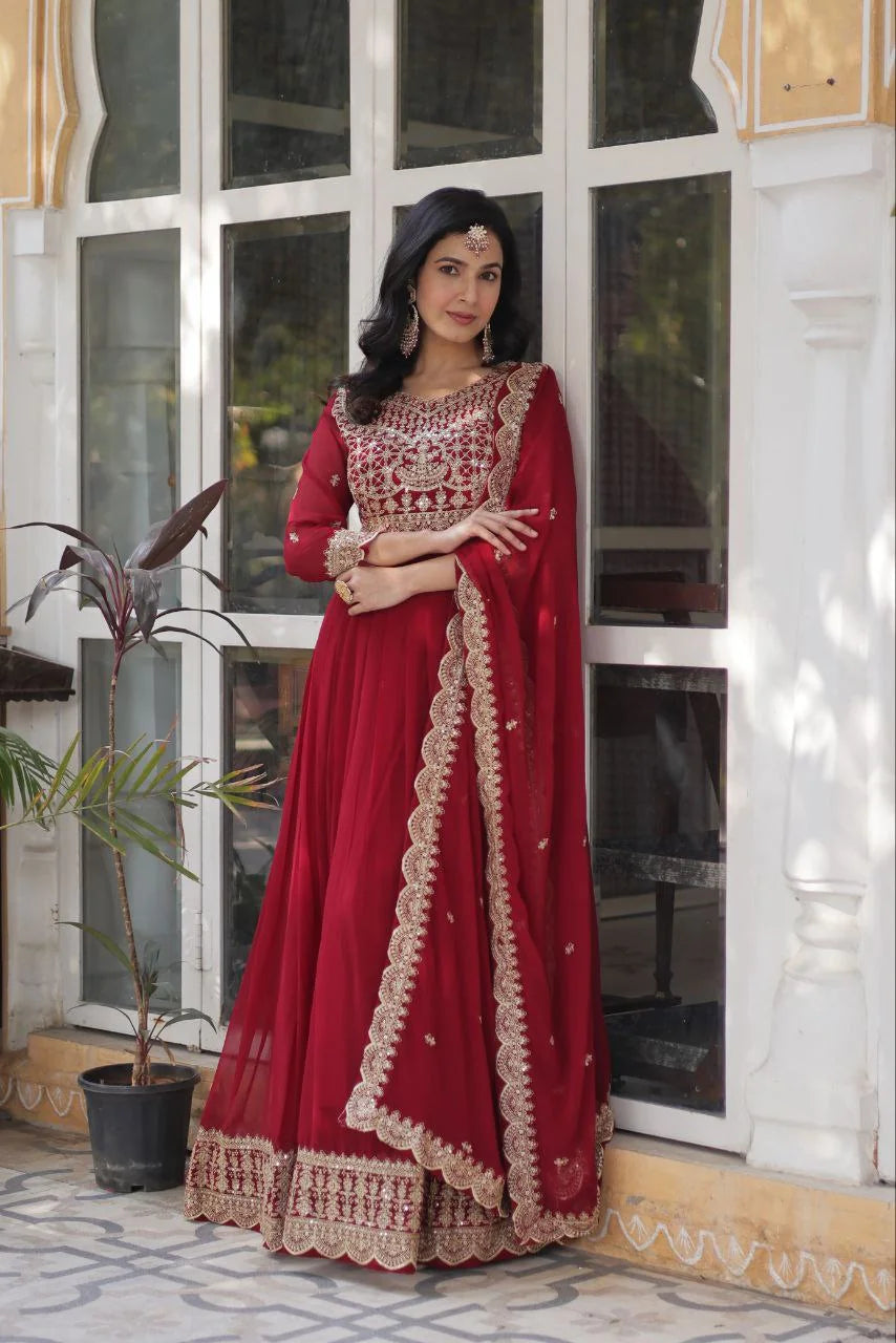 maroon embroidered gown with dupatta standing leaning view