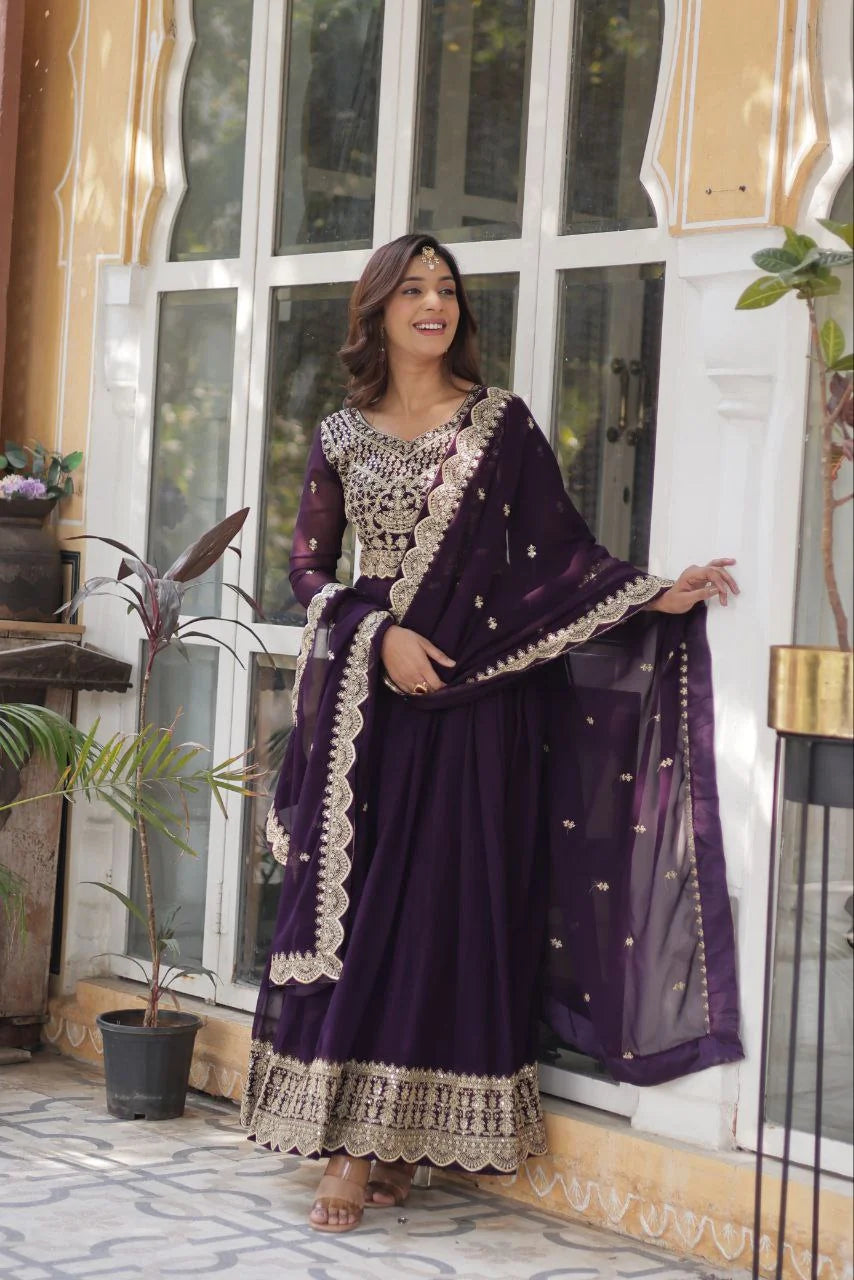 wine colour gown with embroidered dupatta draped view