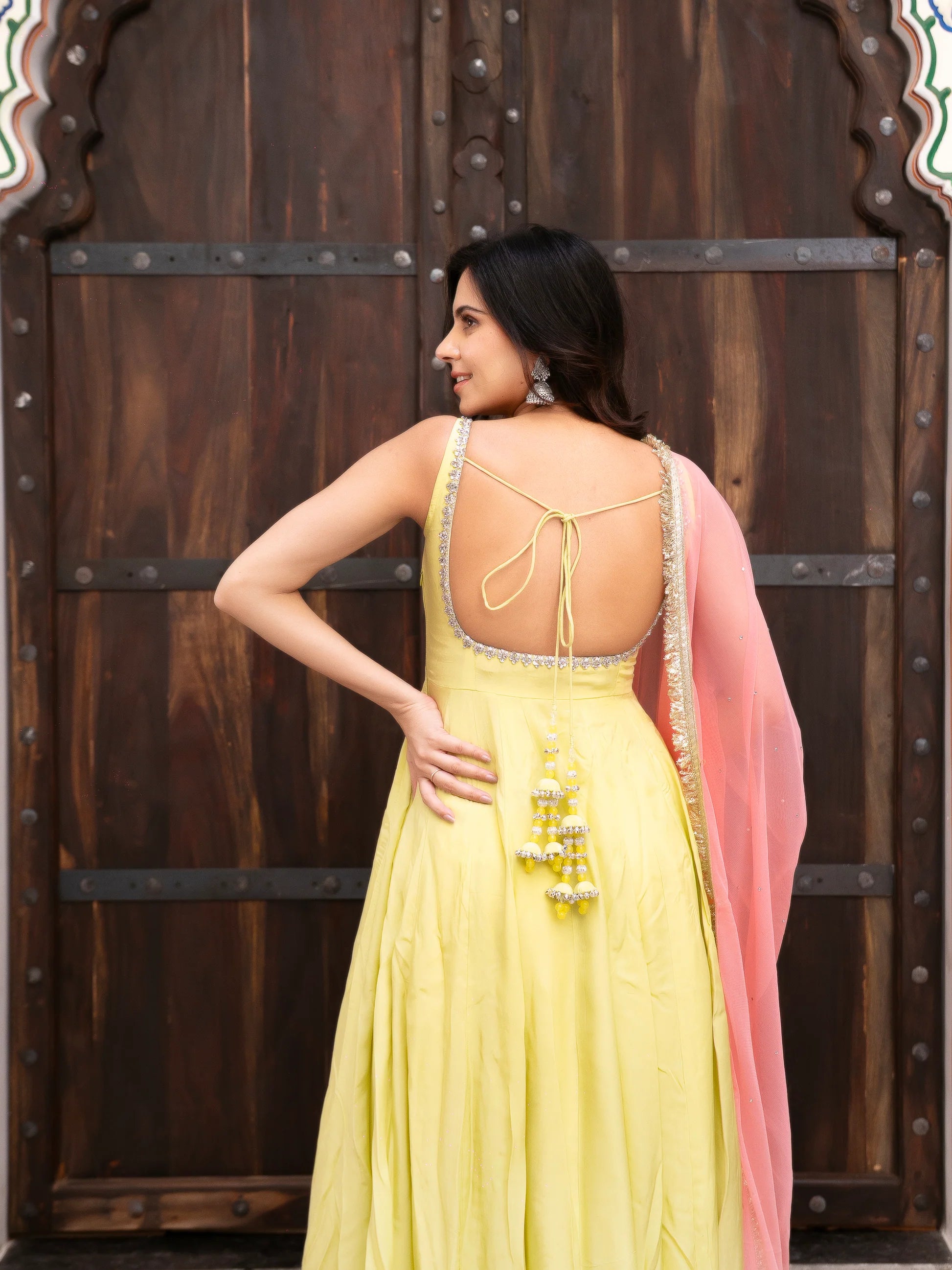 yellow crepe anarkali suit set with dupatta back open tie view