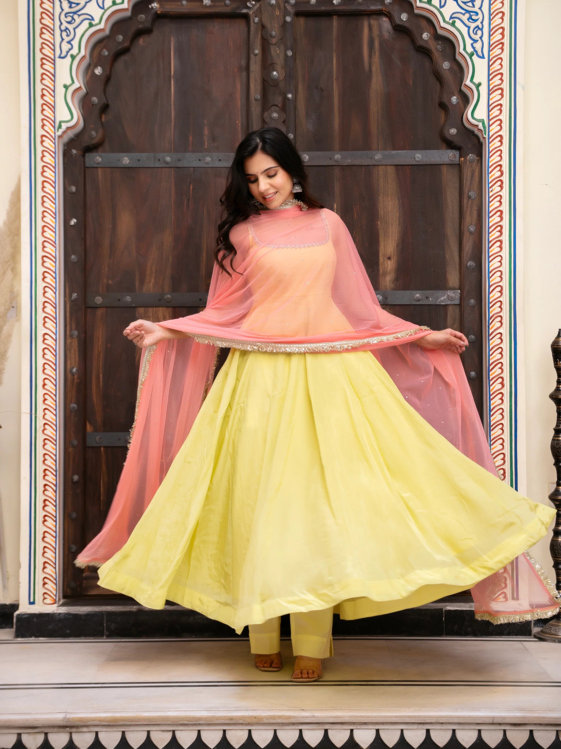 lemon yellow anarkali suit set with dupatta twirl full view