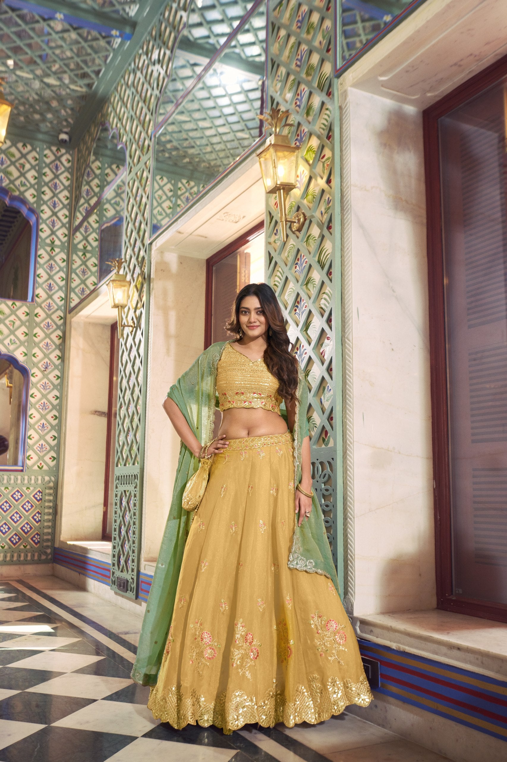yellow nc moss lehenga choli set front view with mint green dupatta
